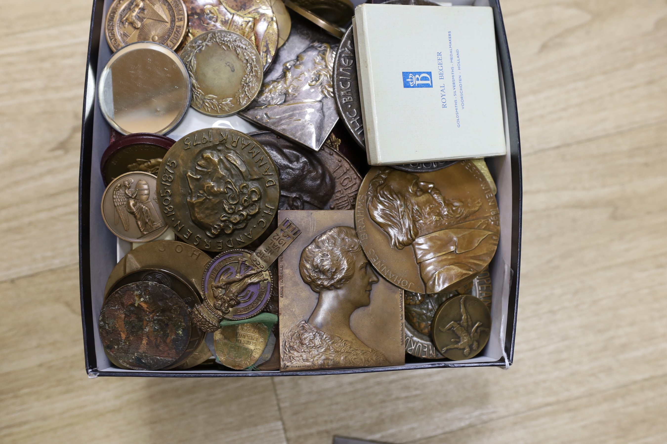 A large and varied collection of mixed cast metal commemorative medallions, mostly European, subjects to include political figures and events, sporting achievements, musical figures, etc, 19th century and later.